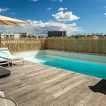 With Heated Rooftop Pool Отель